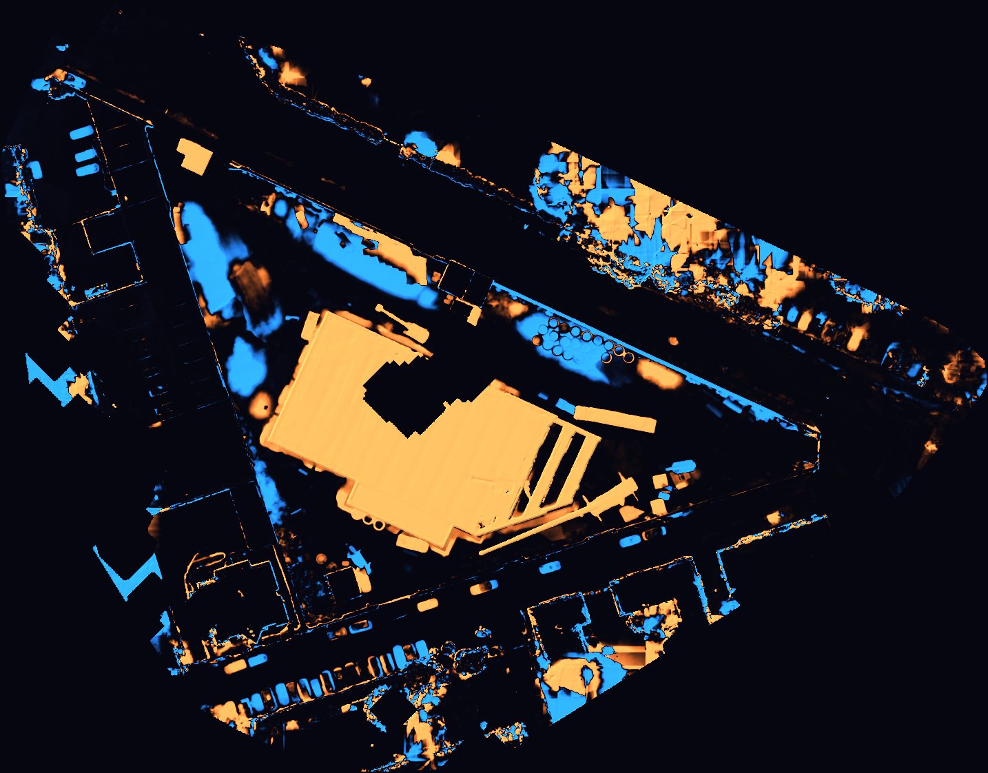 Construction site from above with the areas that gained and lost ground between two surveys picked out