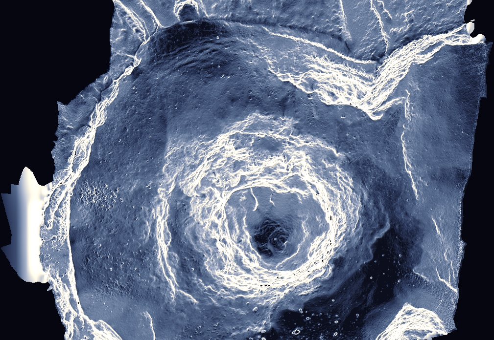 Volcanic terrain rendered by slope, crater rim and flow structures picked out by relief